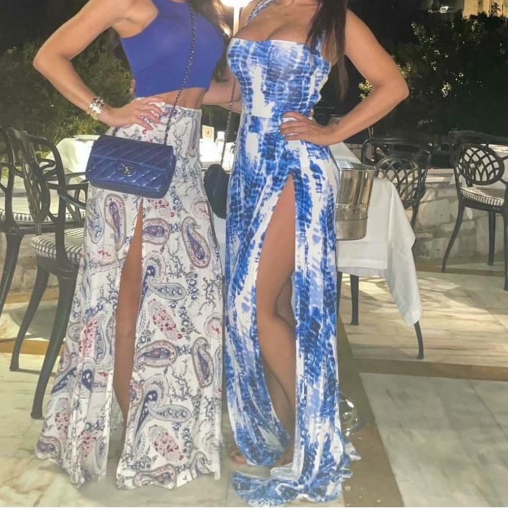 Dress on right blue and white long two slits infront